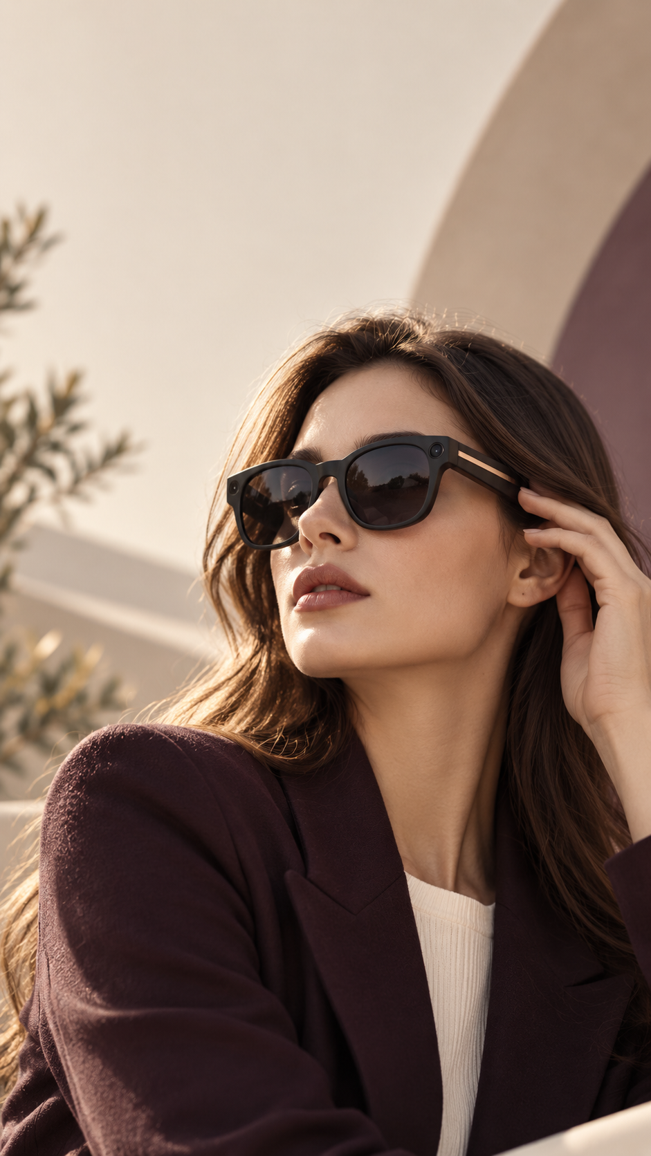 Woman wearing CAELIN Vision One smart glasses